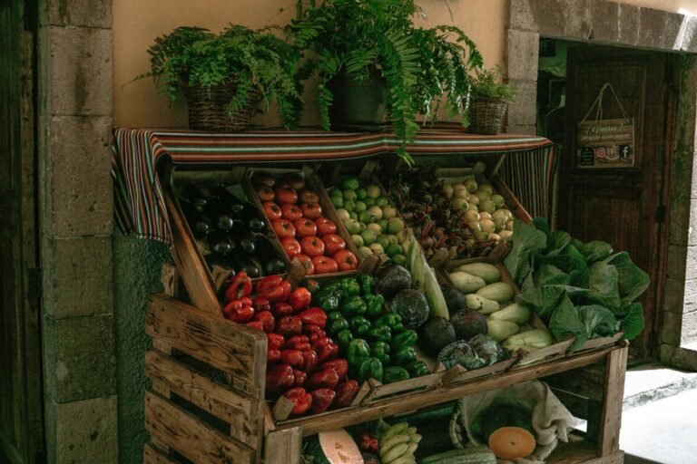Colorful array of fruits and vegetables in a rustic Canary Islands market stall.